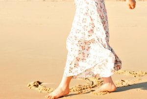 Grounding barefoot on beach